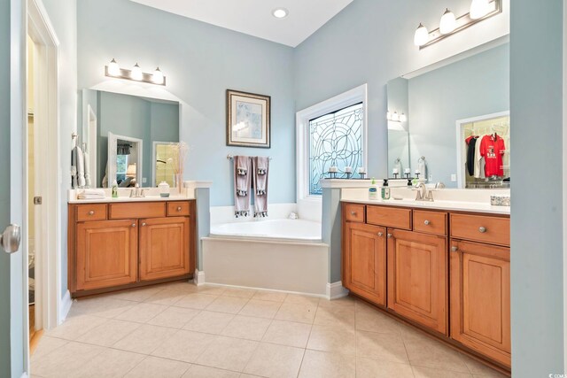 bathroom featuring a tub and vanity