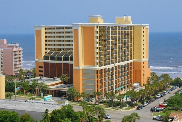 view of building exterior featuring a water view