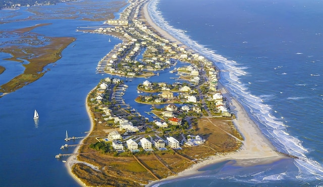 drone / aerial view with a view of the beach and a water view