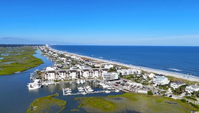 aerial view featuring a view of the beach and a water view