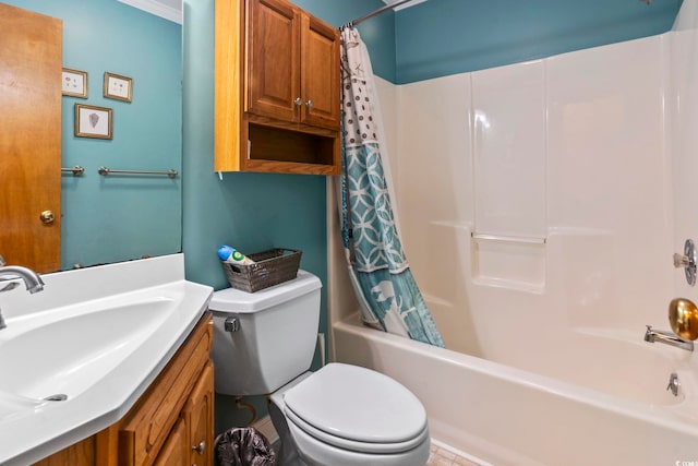 full bathroom featuring toilet, shower / tub combo with curtain, vanity, and ornamental molding