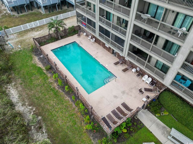 view of swimming pool with a patio