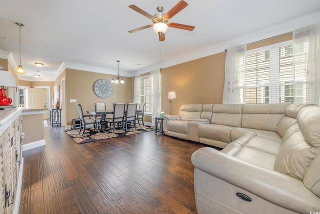 living room with ornamental molding, dark wood-type flooring, and a healthy amount of sunlight