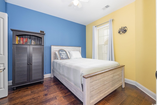 bedroom featuring dark hardwood / wood-style floors and ceiling fan