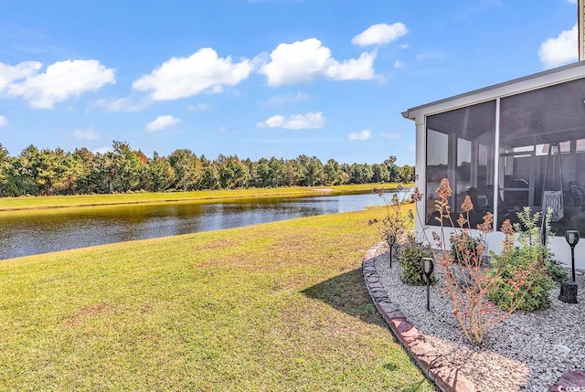 exterior space featuring a water view and a sunroom