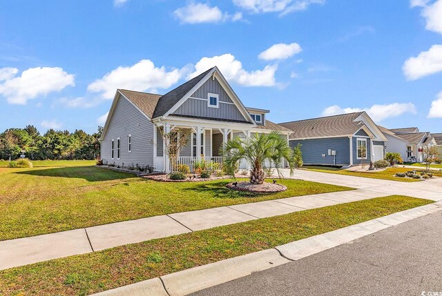 view of front of home featuring a porch and a front yard