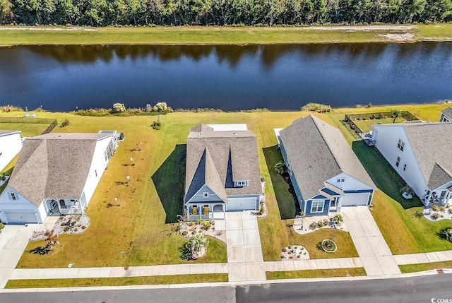 drone / aerial view with a water view