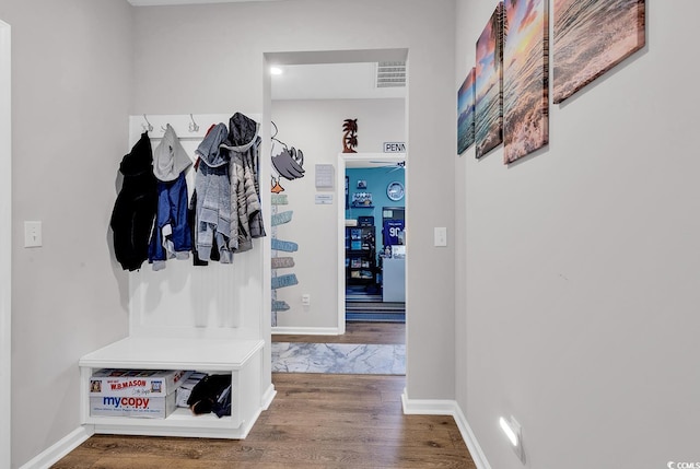 mudroom featuring hardwood / wood-style floors and ceiling fan