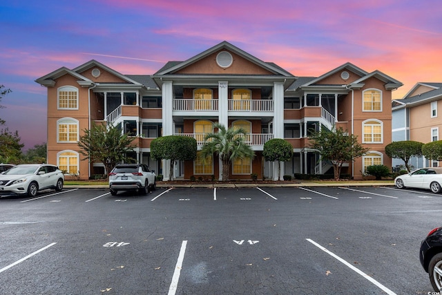 view of outdoor building at dusk