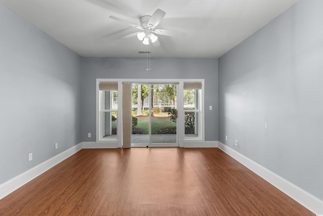 unfurnished room featuring hardwood / wood-style floors and ceiling fan