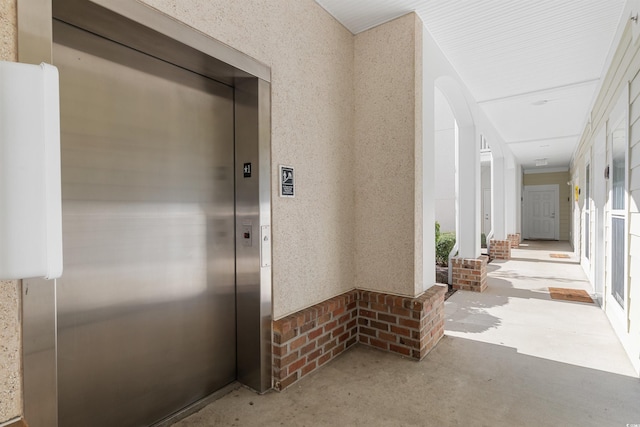 doorway to property with elevator