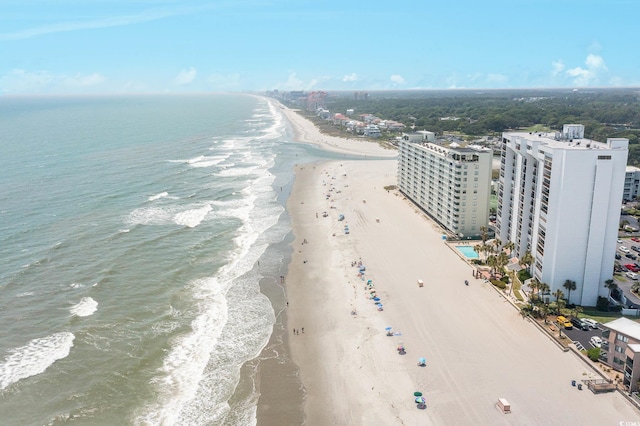 bird's eye view with a beach view and a water view