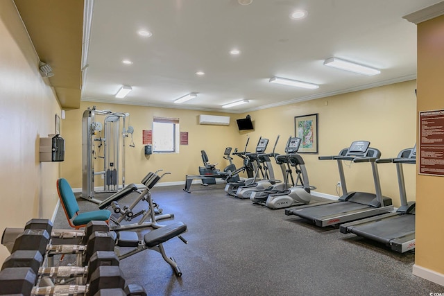 exercise room featuring a wall unit AC and ornamental molding