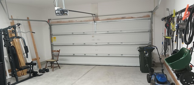 garage featuring a garage door opener