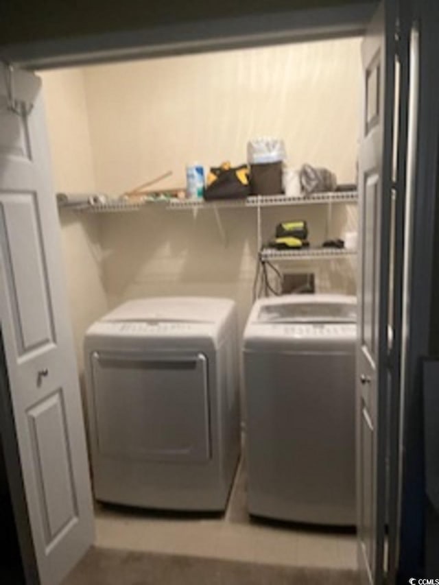 laundry area featuring washer and clothes dryer