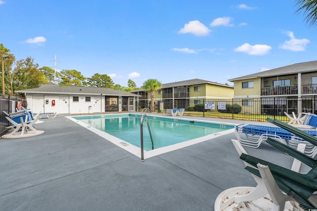 view of swimming pool featuring a patio