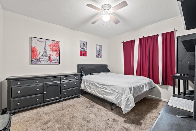 bedroom featuring ceiling fan and carpet flooring