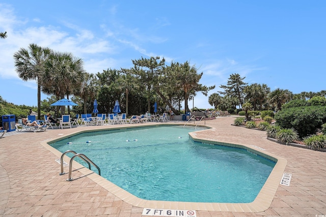 5308 N Ocean Blvd Unit 1014, Myrtle Beach, SC 29577 - community pool with a patio area