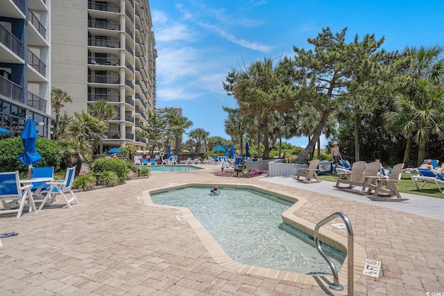 5308 N Ocean Blvd Unit 1014, Myrtle Beach, SC 29577 - community pool with a patio