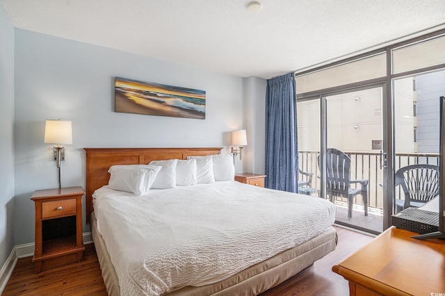 5308 N Ocean Blvd Unit 1014, Myrtle Beach, SC 29577 - bedroom featuring wood finished floors, access to exterior, and baseboards