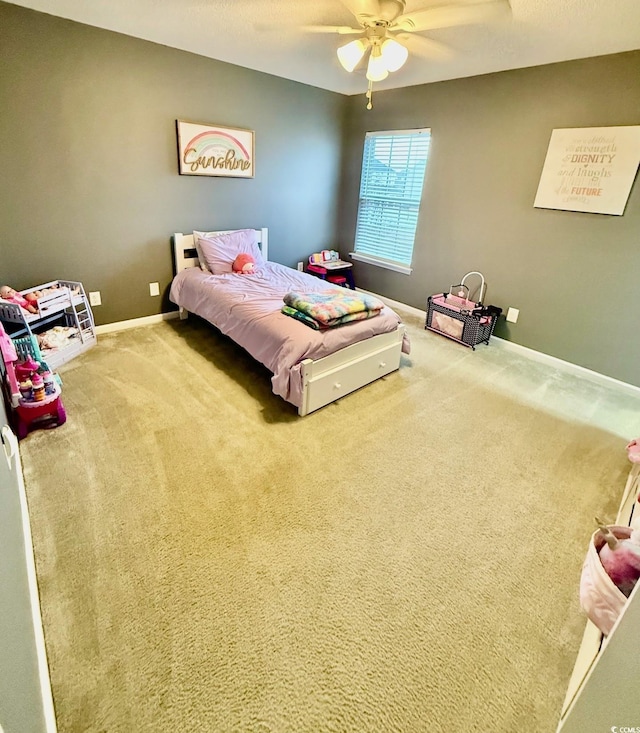 carpeted bedroom featuring ceiling fan