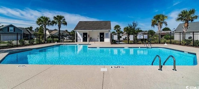 view of pool featuring a patio