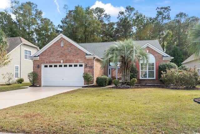 view of front of property featuring a garage and a front lawn