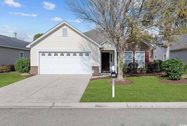 ranch-style house featuring a garage and a front yard