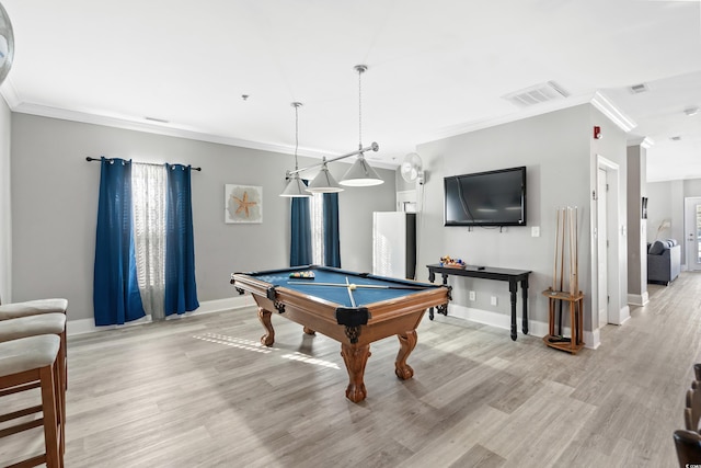 recreation room featuring light wood finished floors, billiards, baseboards, and crown molding