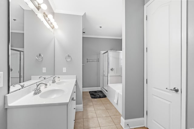 bathroom with a shower with shower door, crown molding, a sink, and tile patterned floors