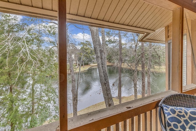 sunroom with a water view