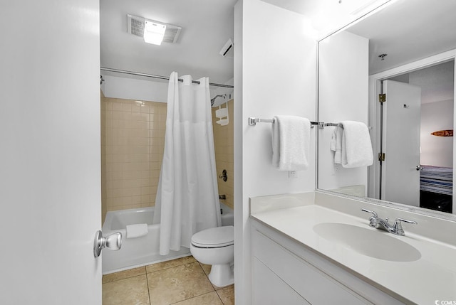 full bathroom featuring tile patterned flooring, vanity, shower / tub combo, and toilet