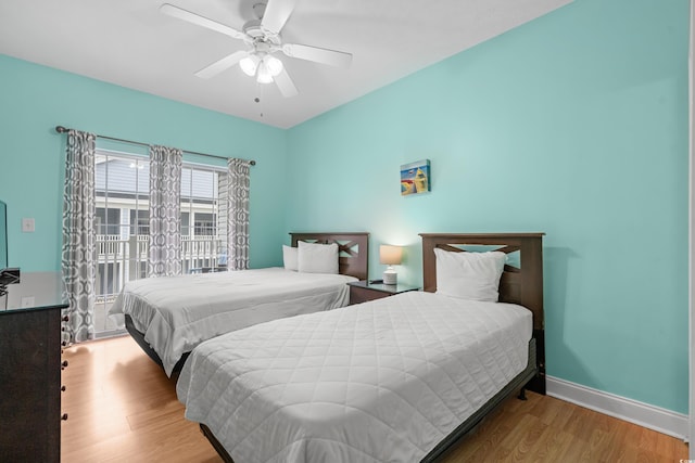 bedroom featuring hardwood / wood-style floors and ceiling fan