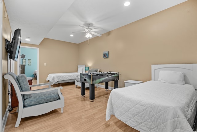 bedroom featuring light hardwood / wood-style flooring and ceiling fan