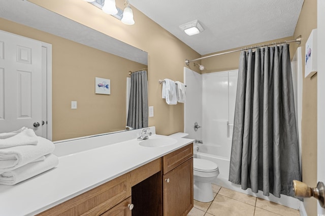 full bathroom featuring tile patterned flooring, a textured ceiling, shower / tub combo with curtain, vanity, and toilet