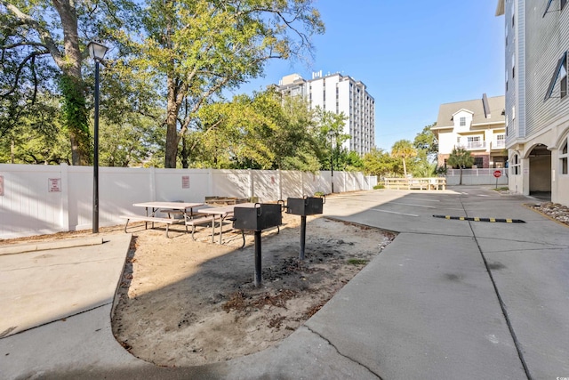 surrounding community featuring a patio area