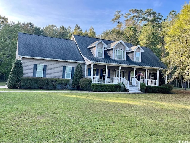 cape cod house featuring covered porch and a front yard