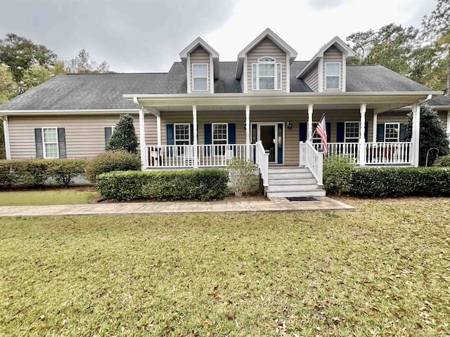 2347 Devine St, Georgetown, SC 29440 - cape cod house with covered porch and a front yard