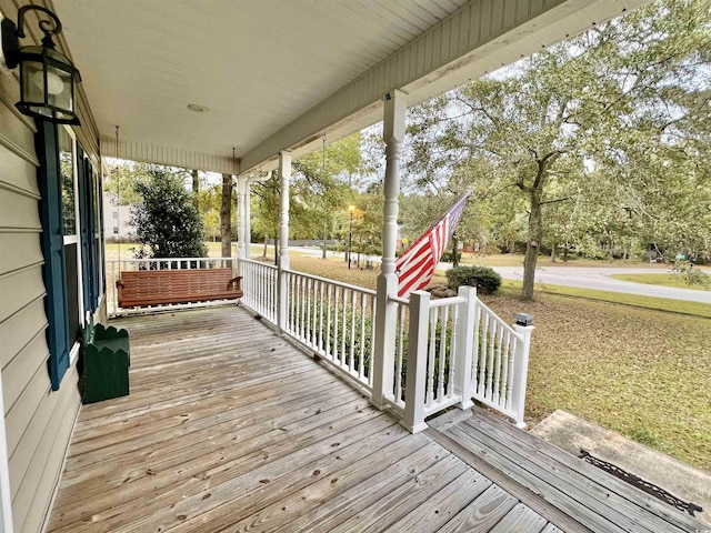 wooden deck featuring a porch