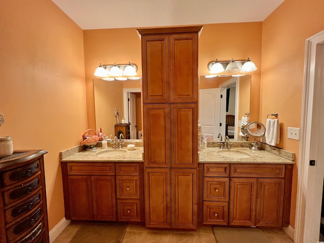 bathroom featuring tile patterned floors and vanity