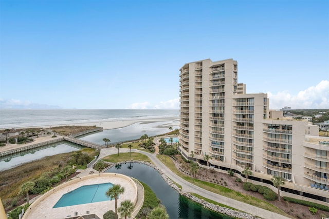 aerial view featuring a view of the beach and a water view