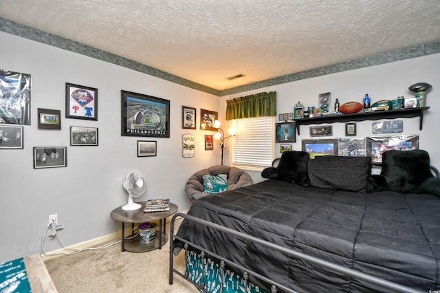 carpeted bedroom with a textured ceiling