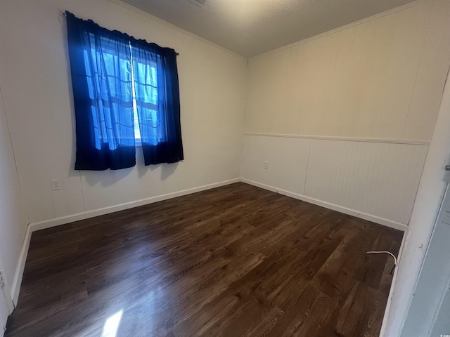 empty room featuring dark hardwood / wood-style floors