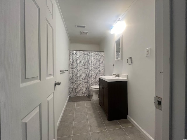 bathroom with toilet, tile patterned flooring, crown molding, vanity, and curtained shower