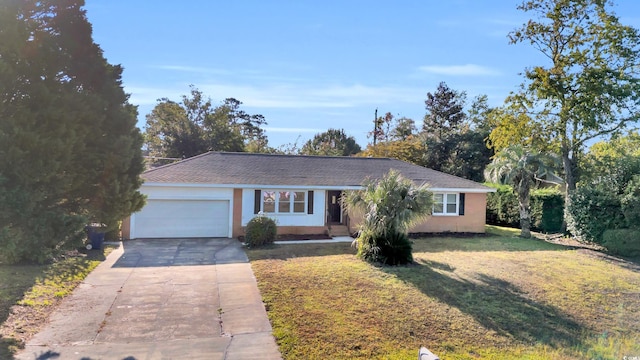 ranch-style house with a front lawn and a garage