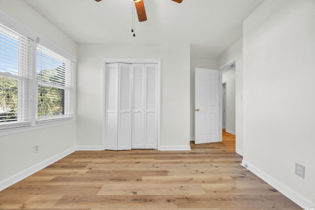 unfurnished bedroom featuring a closet, ceiling fan, and light hardwood / wood-style floors