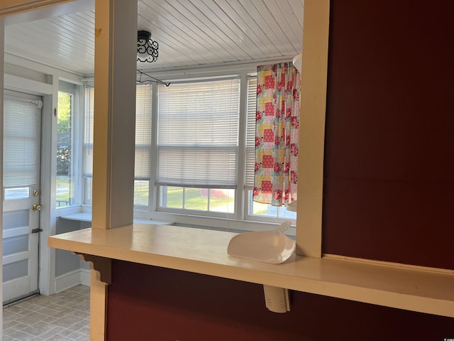 interior space with a breakfast bar and light countertops