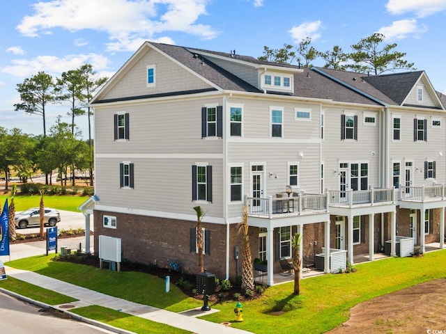 8479 Duke Pl Unit 34, Myrtle Beach, SC 29572 - back of property featuring a yard and brick siding