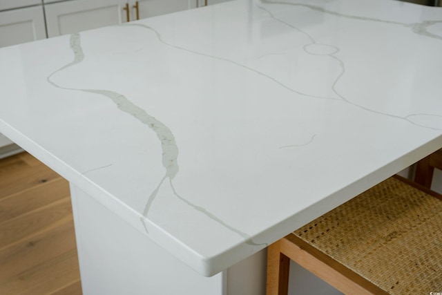 interior details featuring white cabinets