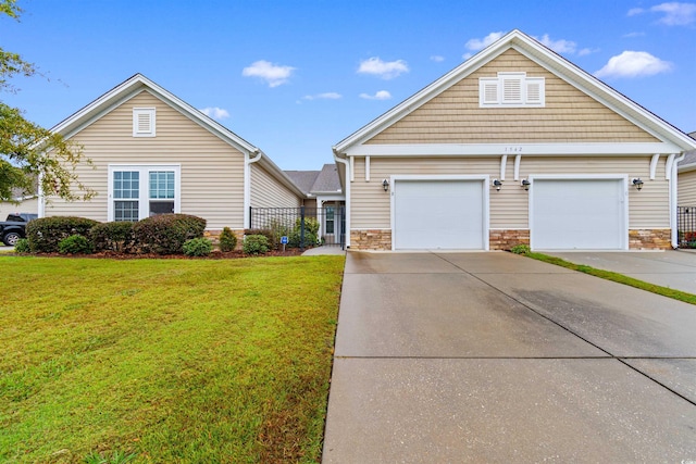 front facade with a front yard and a garage